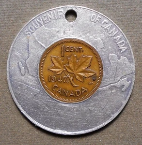 Souvenir Of Canada (Map, Beaver). Encased Canadian 1947 1c, holed for suspension - Picture 1 of 2