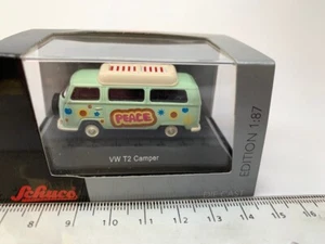 25870 Schuco 1:87 VW T2a Camper mit geschlossenem Dach Peace - Bild 1 von 2