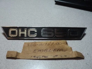 1970-73 Yamaha TX650 XS1 XS2 TX XS 650 EMBLEMA 7 cubierta lateral nuevo fabricante de equipos originales 366-21787-00 - Imagen 1 de 11