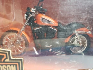 1/18 Diecast Harley Davidson 2002 883 R Sporster Motorcycle By Ertl - Picture 1 of 8