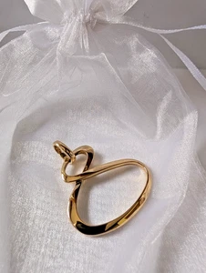 Pierre Lang goldfarbener Endlos Anhänger, Austellungsstück im Schmuckbeutel - Bild 1 von 2