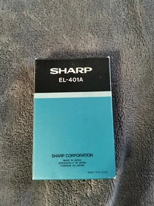 Calcolatrice SHARP vintage EL-401A OROLOGIO GIAPPONESE - Foto 1 di 7