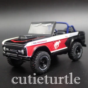 1:64 1966 Ford Bronco 4x4 Ford Performance schwarz rot weiß - Bild 1 von 4