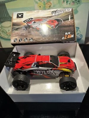 Camión monstruo de alta velocidad de proporción completa 1:22 con 2 bates/cargador/remo gratis para volar Foto 1 de 4