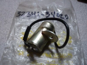 Suzuki GT550 GT 550 1972-77 condensador izquierdo nuevo fabricante de equipos originales P/n 32341-34020 - Imagen 1 de 3