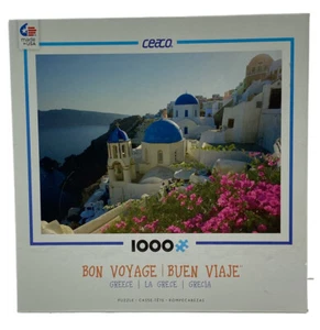 Rompecabezas Ceaco 1000 piezas Bon Voyage Grecia Océano Flores Piedra Edificios Techos Redondos - Imagen 1 de 7