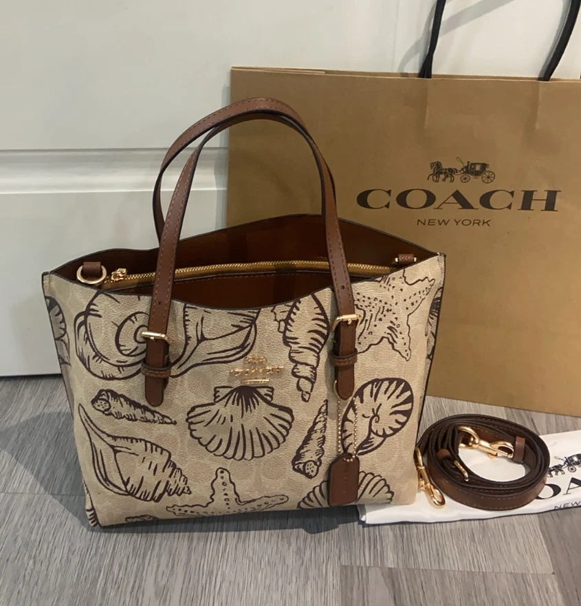 Bolso de Mano Coach Mollie 25 en Lona Signature con Estampado de Carcasa CBH63 Foto 1 de 4