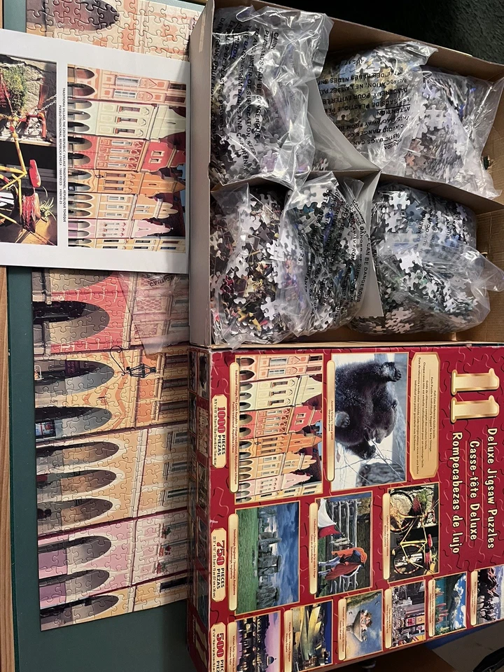 Sure-Lox 11 Deluxe Full Size Jigsaw Puzzles  7250 Total Pieces    Partially New - Image 1 of 3