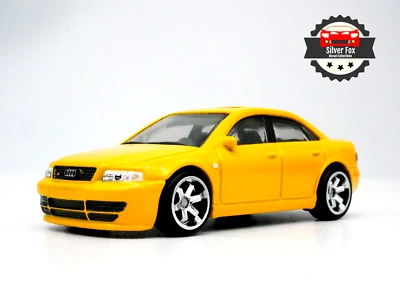 COCHE MODELO COLECCIONISTA AUDI S4 QUATTRO AMARILLO ESCALA 1:64 DIECAST Foto 1 de 4
