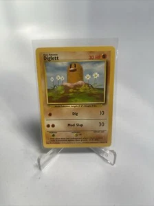 Diglett 47/102 Set Base Comune Pokemon Illimitato 1999 WOTC Vintage quasi nuovo - Foto 1 di 7