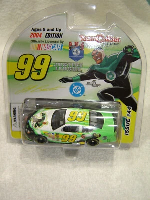 Burton / Edwards #99 JUSTICE LEAGUE  2004 Ford Taurus Team Caliber 1/64 NEW - Image 1 of 2