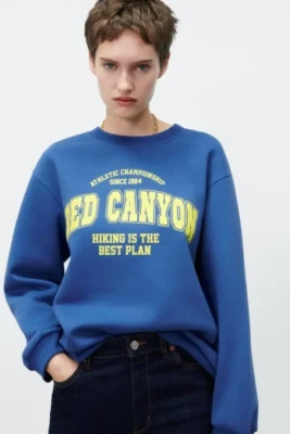 NWT Women's ZARA Blue Red Canyon Text Graphic Print Pullover Sweatshirt, SMALL - Image 1 of 4