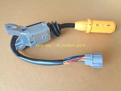 Retroexcavadora JCB - INTERRUPTOR DE COLUMNA DE CAMBIO DE POTENCIA HACIA ADELANTE Y HACIA ATRÁS (N.º DE PIEZA) 701/80145) Foto 1 de 4