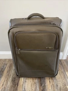 Delsey Rolling Suitcase Luggage Lightweight 26”H x 18”W x 11”D Brown Zip Pockets - Picture 1 of 10