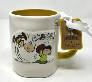 TEMPORADA DE FÚTBOL Peanuts X Rae Dunn Lucy Charlie Brown ¡AUGH! Taza Snatch Kick NUEVA - Imagen 1 de 6