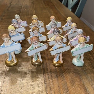 Vtg Name Plates Germany Porcelain Ceramic Little Babies Holding Angels Set of 16 - Picture 1 of 9