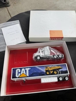 Winross CAT Hauler Dump  Truck Mural Tractor & Trailer 1:64  in Box Caterpillar - Image 1 of 4