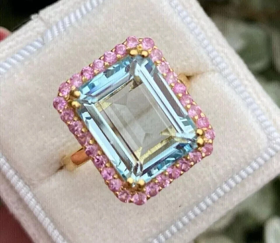 Anillo de aguamarina y zafiro rosa creado en laboratorio esmeralda de 3 quilates enchapado en oro amarillo de 14 quilates Foto 1 de 4