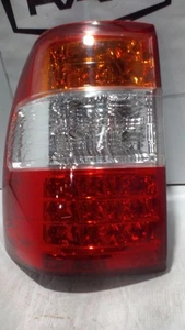 TOYOTA LANDCRUISER 100 SERIES 06/2005-10/2007 LEFT REAR TAIL LIGHT - Picture 1 of 3