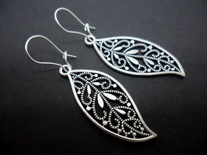 A PAIR OF TIBETAN SILVER LEAF EARRINGS ON SILVER PLATED KIDNEY EAR WIRES. NEW. - Picture 1 of 1