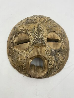 African Tribal Art 10” Round Wooden Mask w/ Metal Embellishment Floral Beige - Image 1 of 4