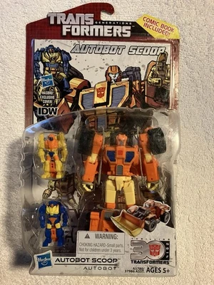 Transformers Generations Thrilling 30 Deluxe Class Targetmaster IDW Comic Scoop Foto 1 de 4