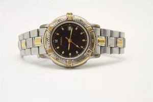 Reloj para mujer FOSSIL AM-1963 esfera oscura tono plata/dorado NECESITA batería - Imagen 1 de 5