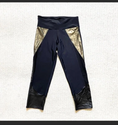Onzie Black & Gold Capri Leggings With Mesh Panels  Size small - Image 1 of 4