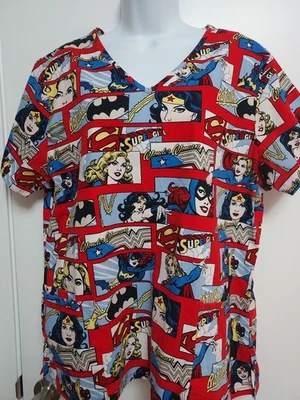 Blusa esfoliante feminina Justice League grande Supergirl/Mulher Maravilha/Batgirl - Imagem 1 de 4