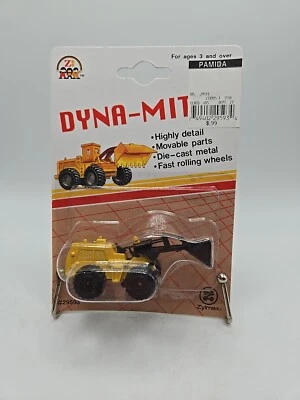 Cargador frontal fundido a presión Dyna-Mites año 1993 piezas móviles SIN ABRIR (Bin12) Foto 1 de 4