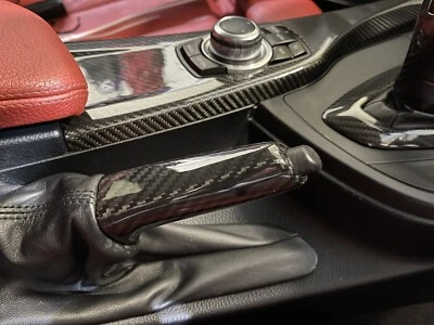 Freno a mano universale BMW originale fibra di carbonio E36 E46 E39 E60 Z4 E84 E85 X1 - Immagine 1 di 4