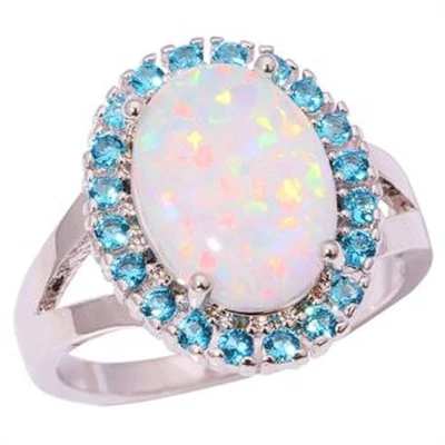 **NEW**GORGEOUS WHITE  FIRE OPAL/AQUAMARINE  RING UK Size "N"   /  US 7 - Image 1 of 4