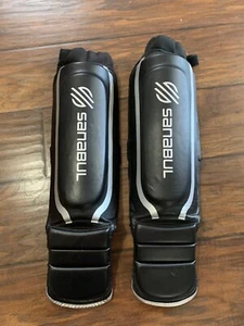 Espinilleras de kickboxing manga esencial Sanabul talla S/M espinilleras MMA Muay Thai - Imagen 1 de 5