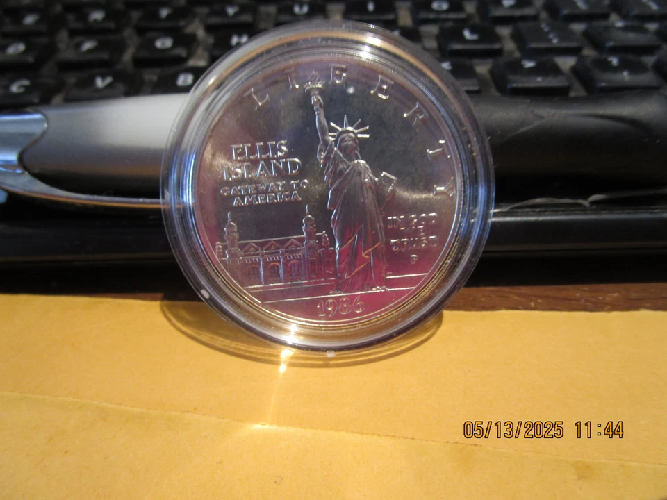 1986 P 1.00 Silver  Ellis Island Ann. Coin  Mint State +++++  With all COA - Image 1 of 4