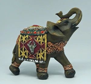 Figur Elefant Elephant aus Polyresin braun mit roten Schmucksteine 21 cm lang - Bild 1 von 2