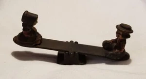 Vintage Collectible Cast Iron Amish Dutch Girl & Boy On A Seesaw Figurine - Picture 1 of 10