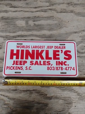 Etiqueta de coche HINKLE'S JEEP mayor distribuidor del mundo letrero blanco/rojo Foto 1 de 4