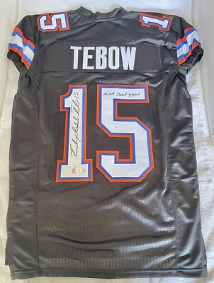 UF FLORIDA GATORS TIM TEBOW signed FULL NAME INSCRIBED GAME CUT JERSEY BECKETT 2 - Image 1 of 4