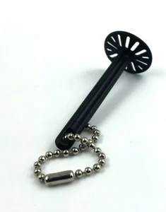 Llavero miniatura Tupperware triturador de patatas negro raro 2" de largo nuevo - Imagen 1 de 1