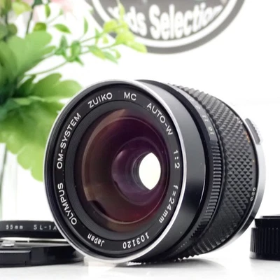 Olympus OM System Zuiko MC Auto-W 24mm f2 lente gran angular de JAPÓN casi... - Imagen 1 de 4