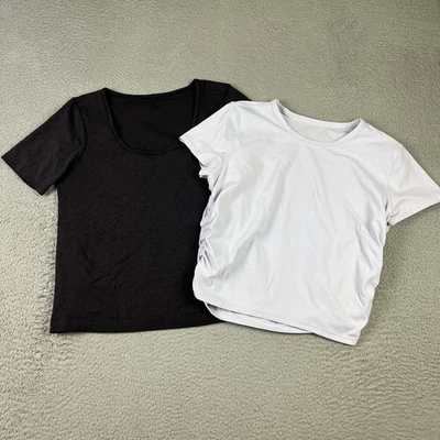 Lote de dos camisas elásticas negras y azules claros Lululemon para mujer Foto 1 de 4