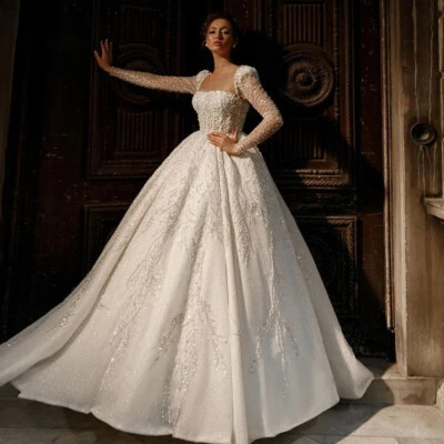 Sparkle A-Line Wedding Dresses Boat Neck Long Sleeved Satin Applique Bridal Gown - Image 1 of 4