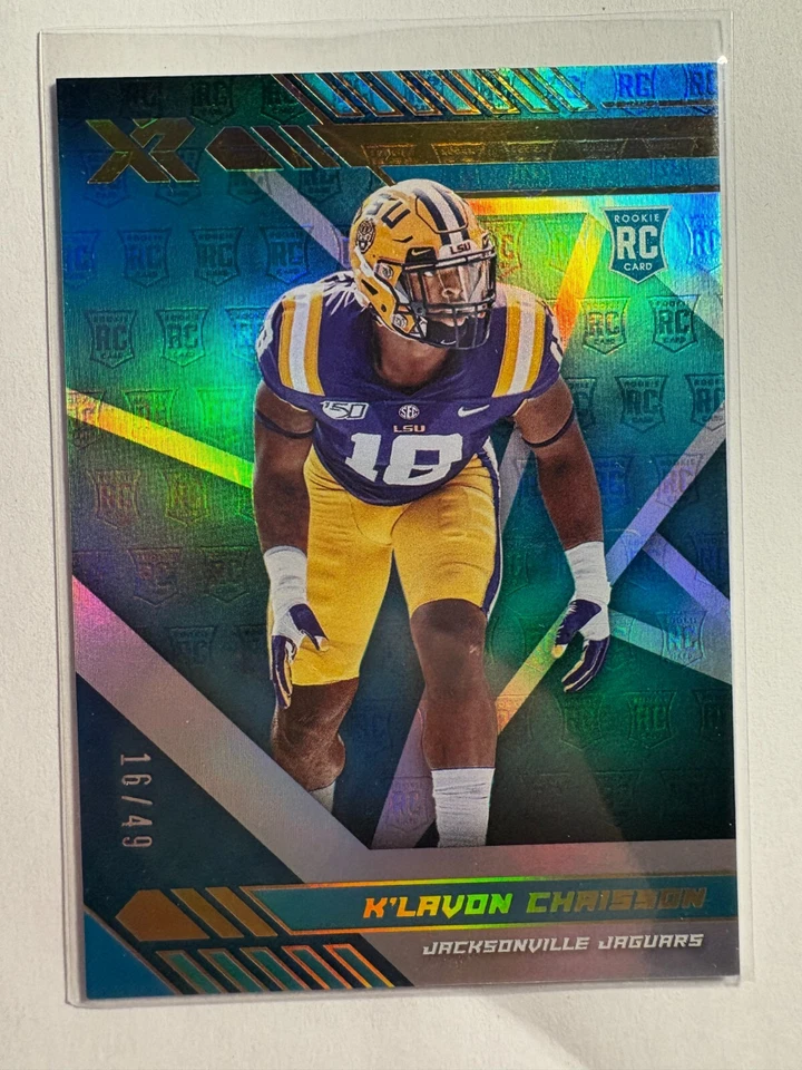 K324,859 - 2020 Panini XR Teal #150 K'Lavon Chaisson #/49 - Image 1 of 1