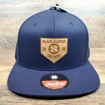 Trevo preto com remendo de couro Rawlings aba plana azul marinho pequeno/médio boné ajuste flexível - Imagem 1 de 4
