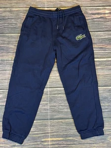 Pantalones deportivos unisex Lacoste azul polar cónicos calce relajado talla pequeña - Imagen 1 de 12