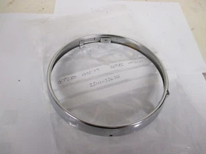 NOS SUZUKI GT380 GT185 HEADLIGHT HEADLAMP RIM 35111-33630 - Picture 1 of 3