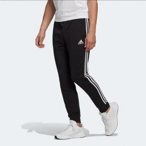 Adidas Hose Essentials French Terry Tapered Cuff 3-Stripes,Herren (Schwarz / Wht - Bild 1 von 6