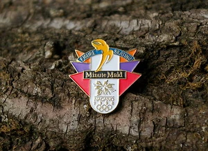 Patinaje artístico Minute Maid Nagano 1998 anillos olímpicos metal esmalte pinback - Imagen 1 de 6