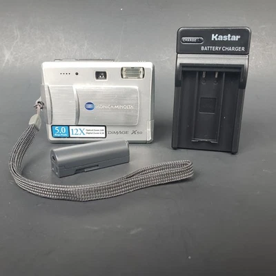 Cámara digital compacta Konica Minolta Dimage X50 plateada 5 MP con batería y cargador Foto 1 de 4