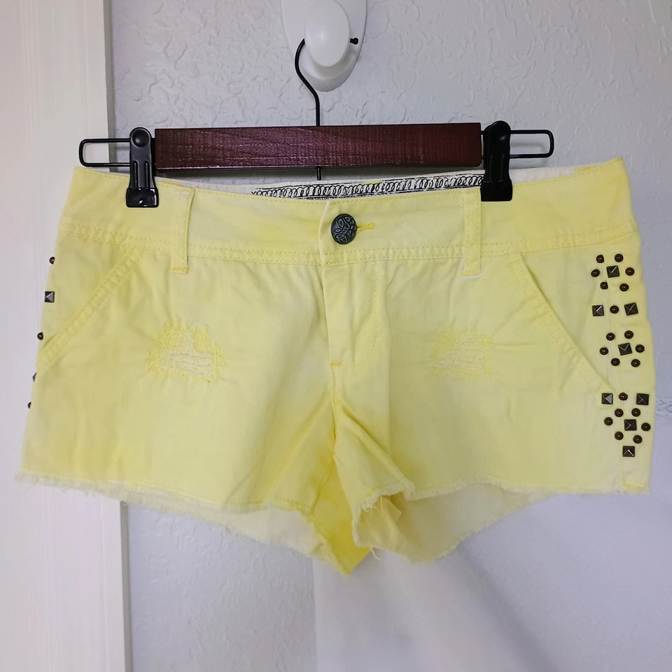 DayTrip Capricorn Cutt Off Distressed Studded Shorts Juniors Sz 26 Yellow Denim - Image 1 of 4